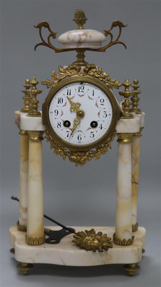 A French rough marble four pillar clock